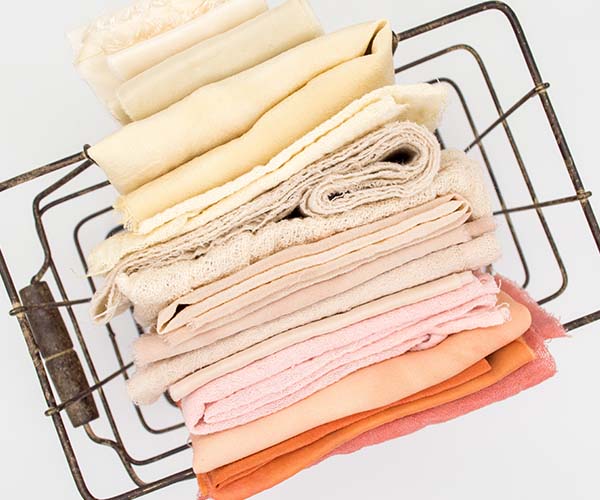 Clean folded laundry in a hamper
