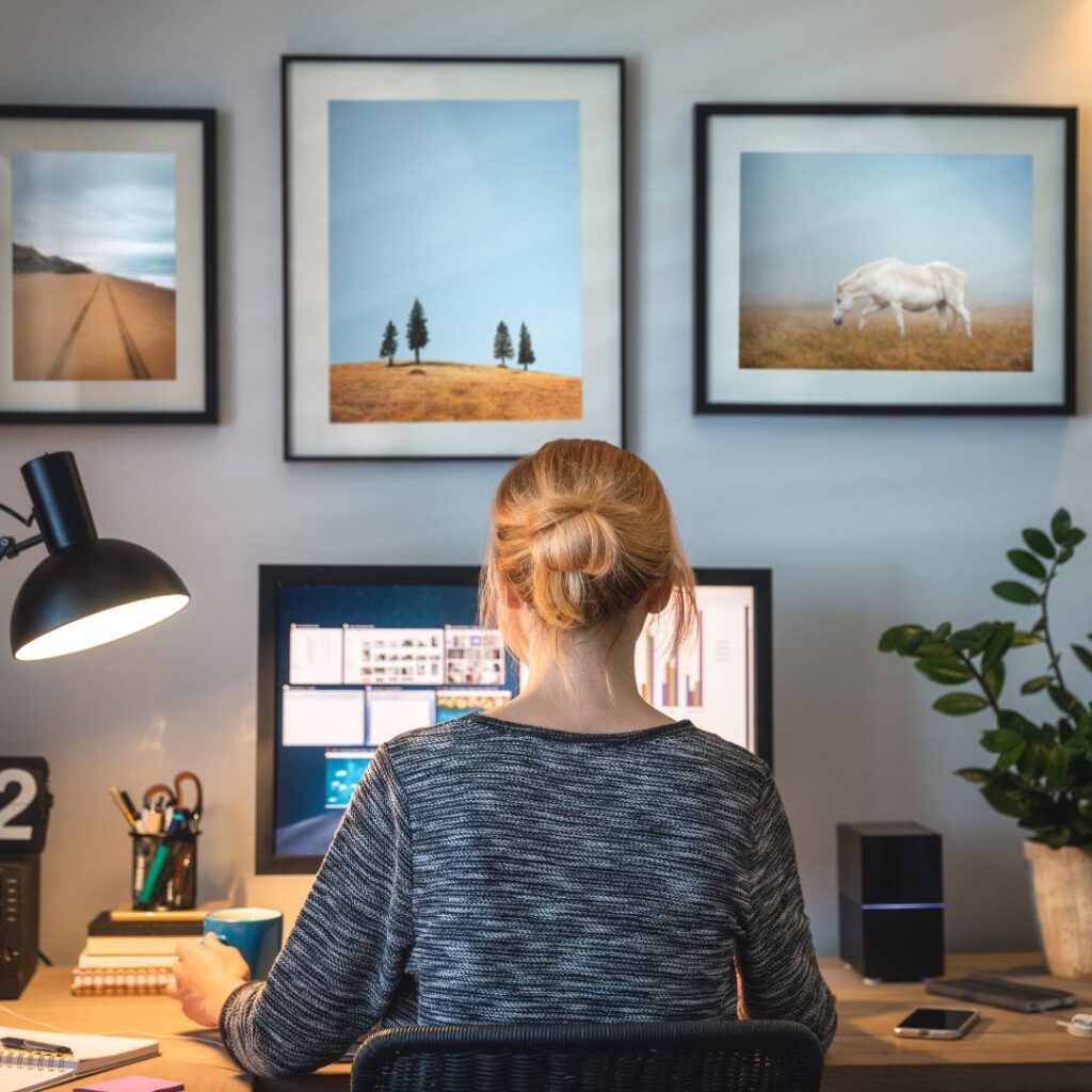 An image of a woman working from home.
