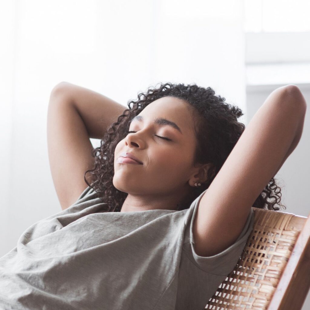 a woman laying back, relaxed