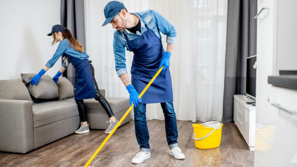 Professional cleaning team cleaning a home.